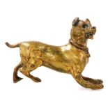 An early 20thC cold painted brass figure of a hound, 6.5cm wide.