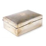 A 20thC silver cigarette box, with engine turned decoration and vacant cartouche, assay for Birmingh