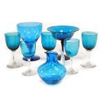 A group of late 19th/early 20thC turquoise cut glass, including five wine glasses, a rummer and a cr