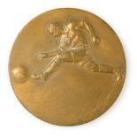 A World War Two bronze football medallion, obverse embossed with a footballer kicking a ball, revers