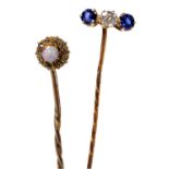 A sapphire and diamond three stone tie pin, set in yellow metal, together with an opal tie pin in a