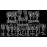 An Edwardian etched glass suite of table glassware, comprising ten champagne flutes, sixteen red win