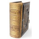 A late 19thC leather bound Holy Bible, The Pronouncing Edition, published by The Earl Publishing Hou