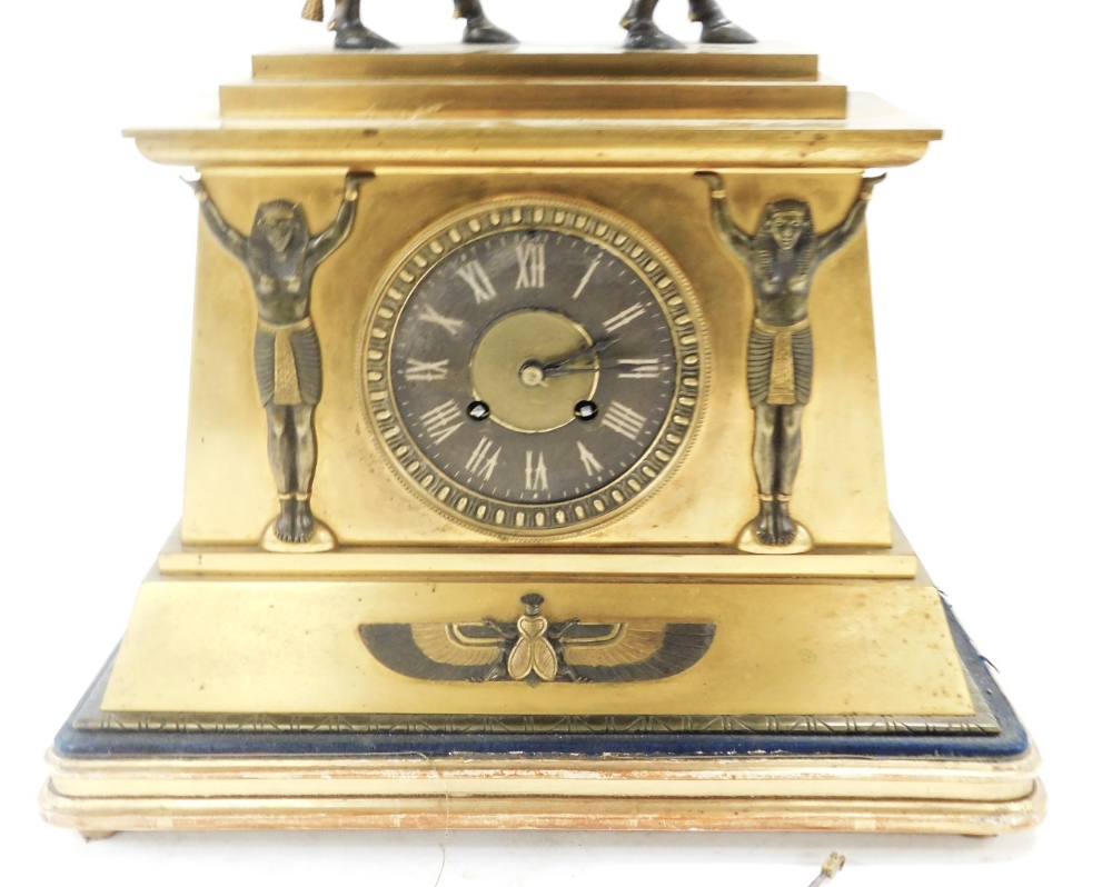 A late 19thC French Egyptian Revival brass cased mantel clock, circular dial with chapter ring beari - Image 2 of 5