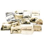 A collection of WWI photographs, depicting images of The Western Front, nurses, wounded, prisoners o