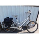 A Cambridge bicycle, in silver trim, with display board and canvas Raleigh saddle bag.
