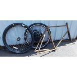 Two bicycle wheels, comprising a Kenda 27.5" wheel, and a Champion alloy rim, 26 x 1.7 wheel, and a