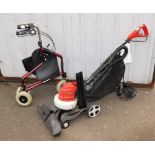 An Eckman electric 3-in-1 garden leaf blower and vacuum, and a mobility walker.