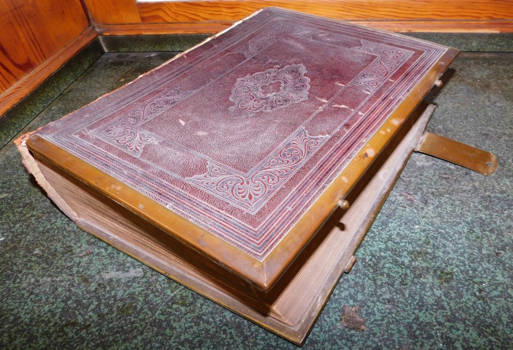 A 19thC leather bound Holy Bible, with commentaries of Henry and Scott condensed by the Reverend Joh