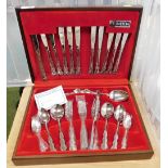 An Oneida stainless steel canteen of cutlery, for six place settings.