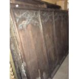 A collection of Victorian carved oak panelling in Gothic style, various sizes to include a quadruple