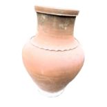 A large terracotta vase or olive jar, 69cm high.