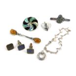 A group of costume jewellery, comprising a terrier silver bar brooch, 4.5cm wide, two pendants beari