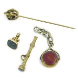 A group of Victorian gilt jewellery, comprising a swivel agate fob set with bullseye and agate, a mi