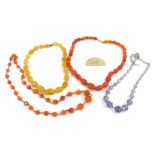 A group of semi precious stone jewellery, comprising orange agate graduated necklace with yellow met