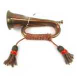 A copper bugle, bearing crest of Argyle and Sutherland, with rope twist handle, 31cm wide.