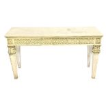 A Neoclassical style marble topped and cream painted console, with two floral carved friezes, raised