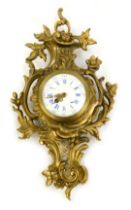 A Louis XV style gilt brass cartel clock, with a white enamel Roman numeric painted dial, with outer
