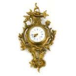 A Louis XV style gilt brass cartel clock, with a white enamel Roman numeric painted dial, with outer