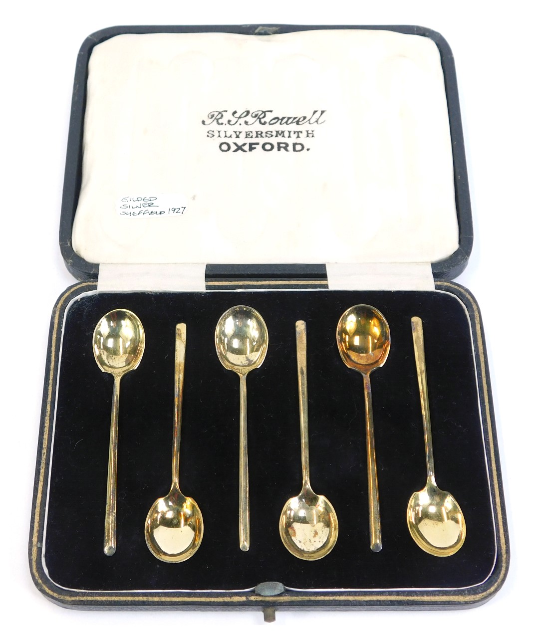 A set of six George V cased gilded silver teaspoons, of plain form, Sheffield 1927, 1.11oz, boxed.