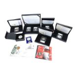 A group of date stamp and Royal Mint collector's coins, comprising The British Isles One Pound Coin