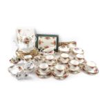 A group of Royal Albert Old Country Roses, comprising teapot, wall clock, lacking hands, seven dinne
