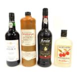 A group of alcohol, comprising a Raspberry Schnapps, Port, a Porto Armilar Tawny Port, and a Cosenwy