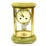 A French green onyx four glass mantel clock, with a circular bevelled top, with cream enamel dial wi