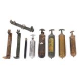 Five vintage fire extinguishers, comprising a green painted example for TC Fire Fighting, a brass ex