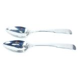 Two silver fiddle pattern serving spoons, each bearing the initial W, Edinburgh rubbed hallmarks, ci