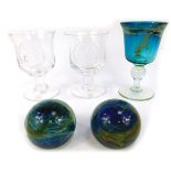 A collection of Art Glass, comprising a pair of turquoise and green swirl Mdina style paperweights,