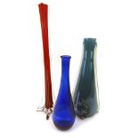 Three items of Art Glass, comprising a fluted stem four point red bud vase, 40cm high, a blue stem v
