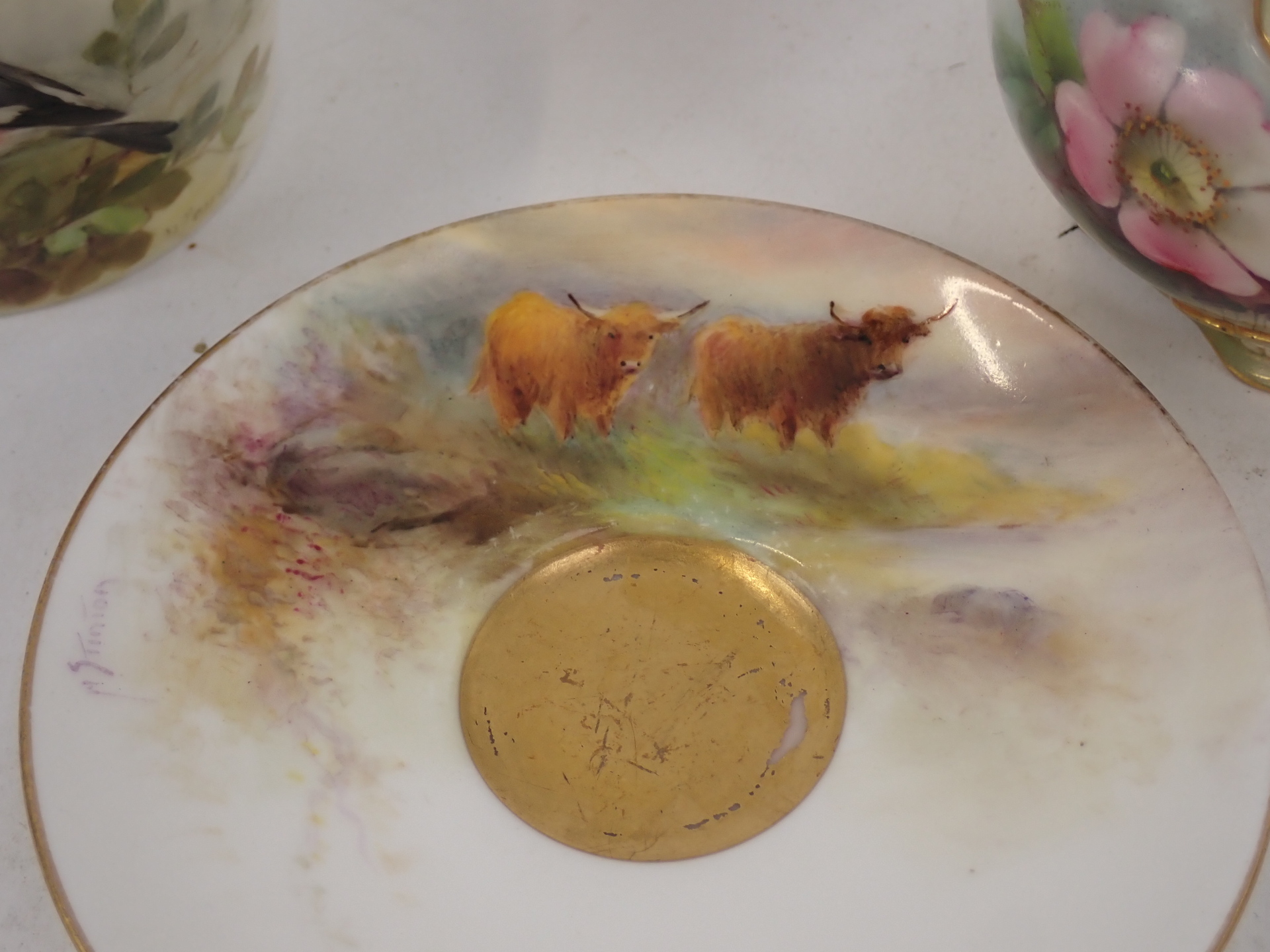 A Royal Worcester porcelain coffee saucer, circa 1927, painted by H Stinton, with Highland cattle, p - Image 2 of 3