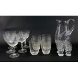A late 19th/early 20thC suite of glass, with cut decoration of African animals, to include giraffe,