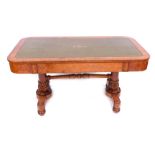 A William IV burr elm library table, the rectangular top with rounded corners, and a green and gilt