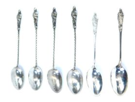 Silver Apostle coffee spoons, comprising a set of four, with twisted handles, and two further bottle