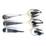 Three Victorian and later silver serving spoons, one inscribed IGL 21AOUT 1831, the other bearing th