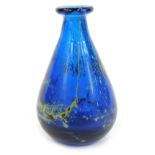 An Art Glass bud vase, on a blue ground with green mottled decoration, possibly Mdina, 10.5cm high.