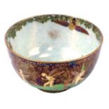 An early 20thC Wedgwood Fairyland lustre bowl, designed by Daisy Maceig-Jones, decorated with woodla