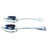 Two Victorian silver fiddle pattern serving spoons, each bearing the initial B, maker W C, London 18