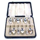 A cased set of six George V silver teaspoons, each with floral design top, Sheffield 1934, cased, 1.