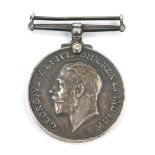 A World War I George V 1914-18 Defence medal, inscribed 174650 GNR.J.W.O.ROMAN R.A.
