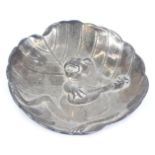 A late Victorian cast silver circular dish, in the form of a frog playing a mandolin on a lily pad,