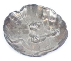 A late Victorian cast silver circular dish, in the form of a frog playing a mandolin on a lily pad,