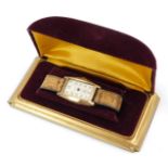 A Consort gentleman's wristwatch, in a gold plated case, with elongated rectangular watch head, lack