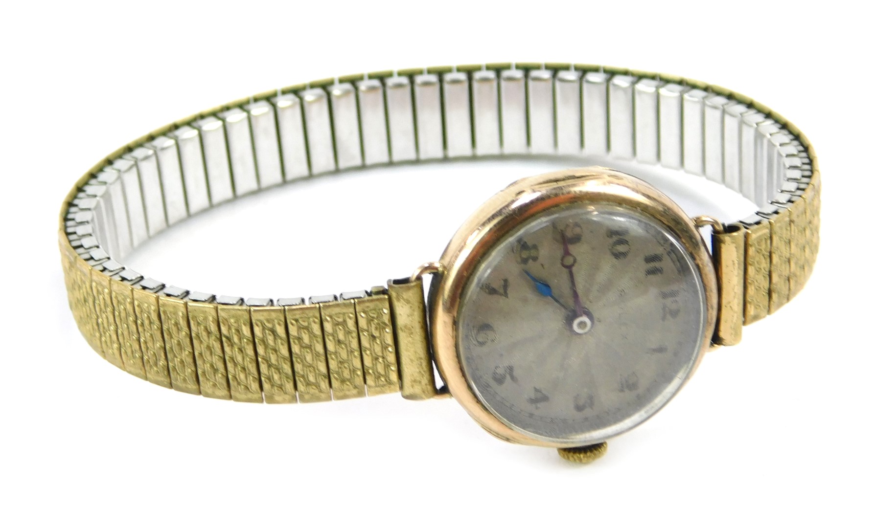 A 9ct gold lady's Rolex wristwatch, with a circular silvered numeric dial, in a 9ct gold case, with