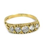 A 9ct gold half hoop dress ring, set with five round brilliant cut cz stones, each in claw setting,