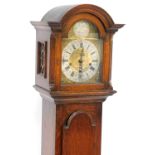 An oak cased grandmother clock, stamped Brabingtons Limited, London, Renoun All British., the brass