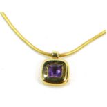 A 9ct gold pendant and chain, the square pendant set with amethyst, on snake link chain, 50cm long,