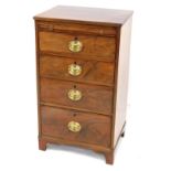 An early Victorian mahogany bachelor's chest, with brushing slide over four long graduated drawers,